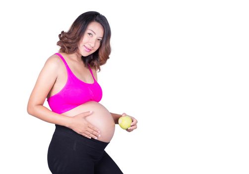 Beautiful pregnant woman with green apple isolated on white background