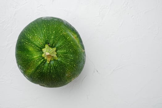 Ripe Zucchini set, on white stone table background, top view flat lay, with copy space for text