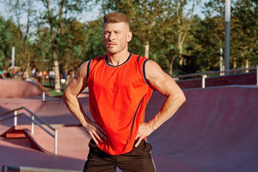 sports man on the playground in the park workout. High quality photo