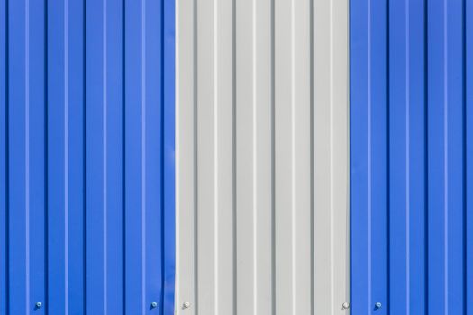 Blue and White Painted Sheet Metal Plates Iron Fence Texture Background.