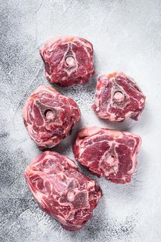 Raw lamb neck meat on cooking table..White background. Top view.