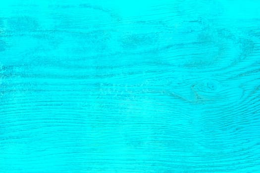 Old wooden surface with blue paint plank texture background.