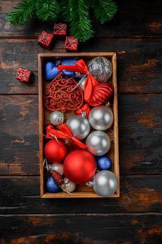 Christmas decoration collection set, in wooden box, top view flat lay, on old dark wooden table background