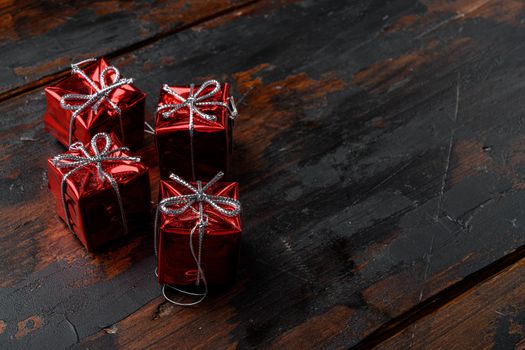 Ball for the Christmas tree set, on old dark wooden table background, with copy space for text