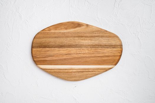 Pine wooden cutting board set, on white stone table background, top view flat lay , with copy space for text or your product