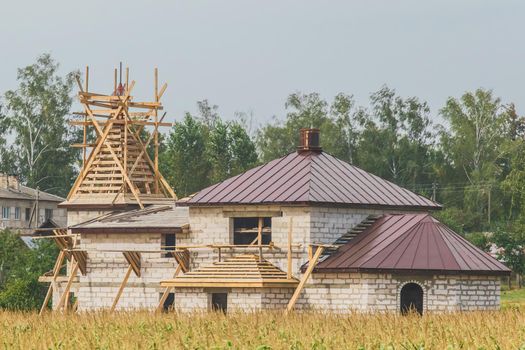 Repair, restoration or reconstruction and construction of new architecture or house in a rural field.