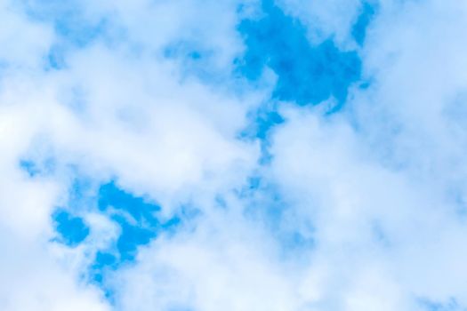 White soft clouds on blue sky texture background.