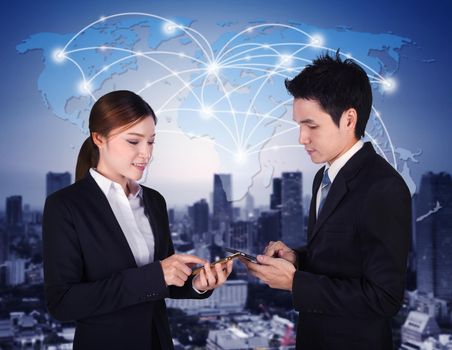 man and woman using smartphone with world social media network connection