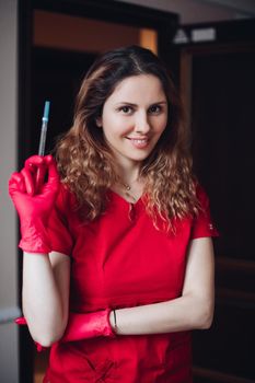 cheerful woman cosmetologist preparing for lip augmentation procedure