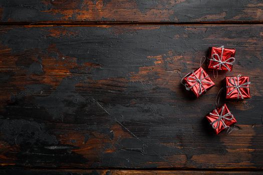 Vintage Christmas decorations set, top view flat lay, on old dark wooden table background, with copy space for text