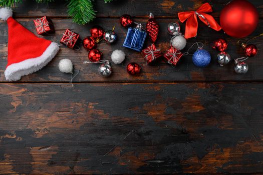 Christmas tree decoration set, top view flat lay, on old dark wooden table background, with copy space for text