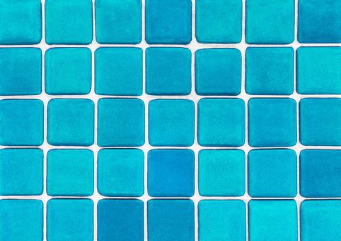 Blue light abstract mosaic ceramic tile texture, square cold background.