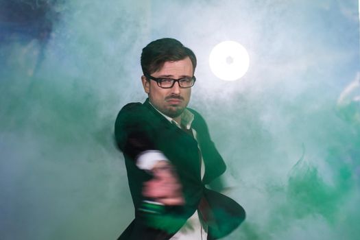 Pasadoble, latin solo dance and contemporary dance - Handsome male dancing into smoke cloud