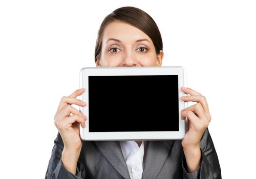 Businesswoman holding tablet computer with blank screen. Happy woman in business suit show tablet PC near her face. Corporate businessperson isolated on white background. Digital technology layout
