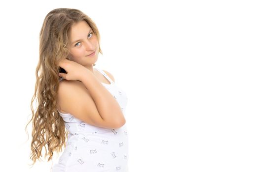 A schoolgirl girl with beautiful long hair. Isolated on white background.