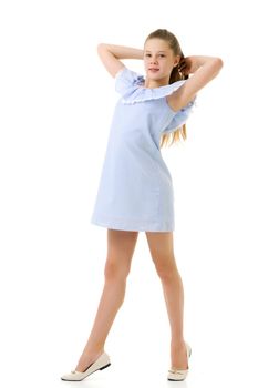 Beautiful Smiling Teen Girl Standing with Raising Hands, Portrait of Pretty Girl Wearing Stylish Short Light Blue Sundress and Beige Shoes Posing in Studio Against White Background