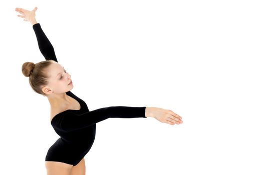 Little girl gymnast in a beautiful sports swimsuit for competitions, close-up. The concept of sport and fitness, a happy childhood. Isolated on white background.