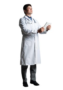 young doctor with a tablet computer, in a white medical coat and with a stethoscope