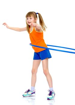 A girl gymnast performs an exercise with a hoop. The concept of gymnastics and fitness. Isolated on white background.