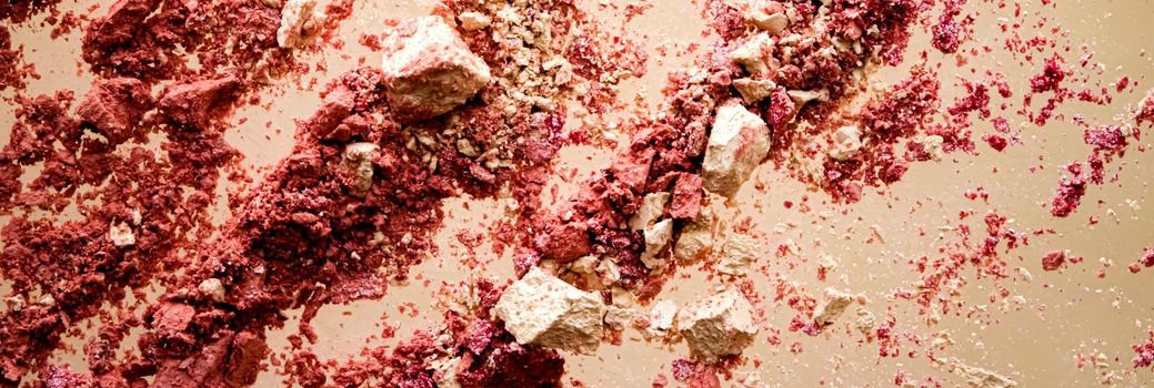 Crushed cosmetics, mineral organic eyeshadow, blush and cosmetic powder isolated on golden background, makeup and beauty banner, flatlay design.