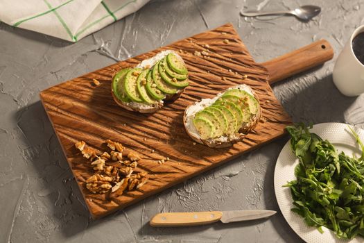 sliced avocado on toast bread with spices.