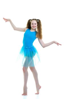 A gymnast girl prepares for the exercise. The concept of childhood and sport, a healthy lifestyle. Isolated on white background.