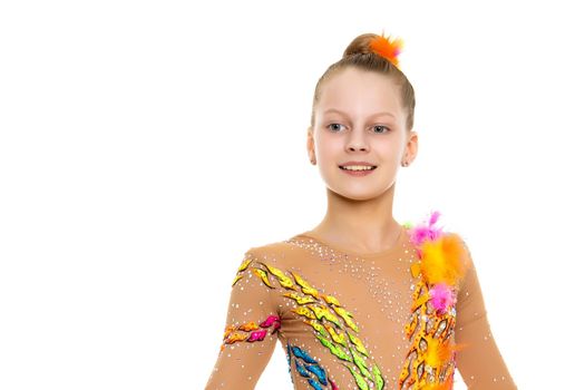 Little girl gymnast in a beautiful sports swimsuit for competitions, close-up. The concept of sport and fitness, a happy childhood. Isolated on white background.