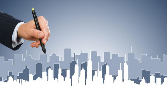 Hand of man designer drawing with stylus construction project