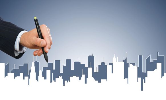 Hand of man designer drawing with stylus construction project