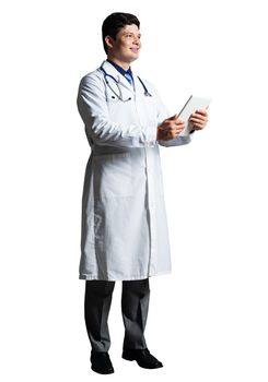 young doctor with a tablet computer, in a white medical coat and with a stethoscope