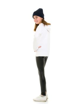 Portrait of a gymnast girl in a tracksuit. Isolated on white background