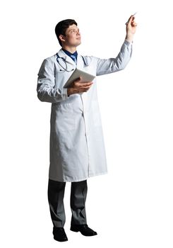 young doctor with a tablet computer, in a white medical coat and with a stethoscope