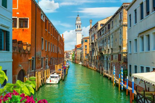 Canal in Venice between the old houses