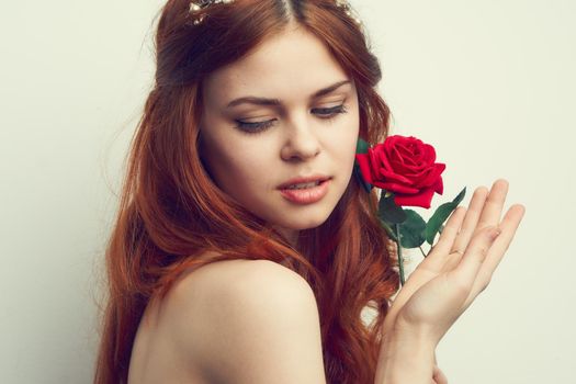 attractive woman with rose flower makeup romance model. High quality photo