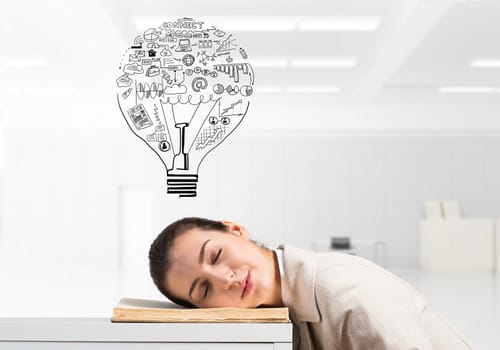 Exhausted business woman sleeping on desk with open notebook. Tired corporate employee relaxing in office. Worker in white suit overworking. Idea light bulb sketch with business doodles above head.