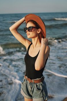 pretty woman on the beach summer vacation lifestyle sun. High quality photo