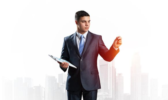 Business expert standing and pointing copy space. Accounting and consulting. Handsome man in formal wear on background foggy cityscape. Financial specialist with raised hand promotion mockup.