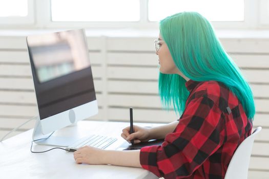 Illustrator, creative, web design concept - Female graphic designer at work.