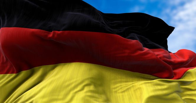Detail of the national flag of Germany flying in the wind. Democracy and politics. European country.