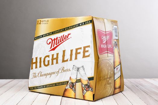 IRVINE, CALIFORNIA - December 4, 2015: Miller High Life 12 pack bottles. High Life, a pilsner style beer, is Millers oldest brand entering the market in 1903