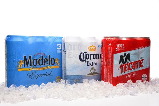 IRVINE, CALIFORNIA - MARCH 21, 2018: Three packs of 24 ounce Mexican Beers. Modelo Especial, Corona Extra and Tecate Original with ice.