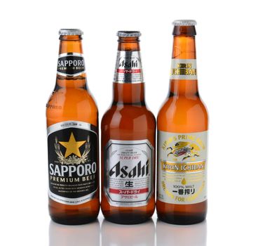 IRVINE, CA - JANUARY, 11, 2015: Three bottles of Japanese beers. Sapporo, Asahi and Kirin Ichiban are three of the most popular Japanese beers imported into the USA