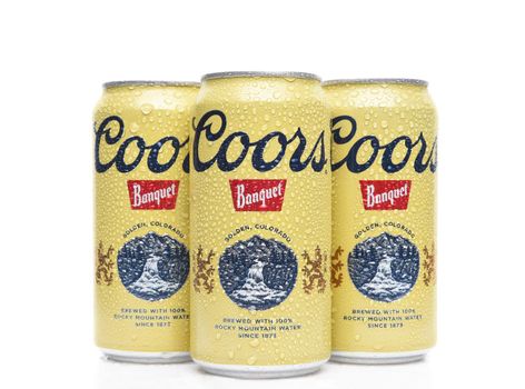 IRVINE, CALIFORNIA - AUGUST 19, 2019: Closeup of 3 cans of Coors Banquet Beer. Brewed solely in Golden, Colorado with Rocky Mountain water and Moravian barley.