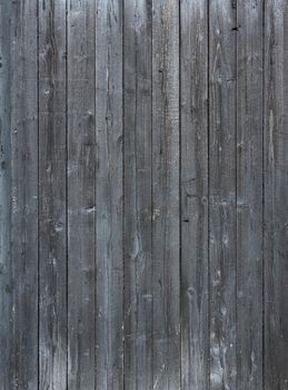 dark grey background pattern of vertical wooden old grungy painted planks on old barn