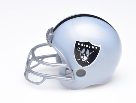 IRVINE, CALIFORNIA - AUGUST 30, 2018: Mini Collectable Football Helmet for the Oakland Raiders of the American Football Conference West. 