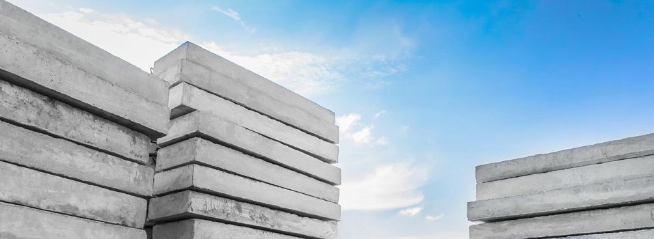 Concrete blocks at a construction site. Concrete structures, industrial, building materials, high resolution.