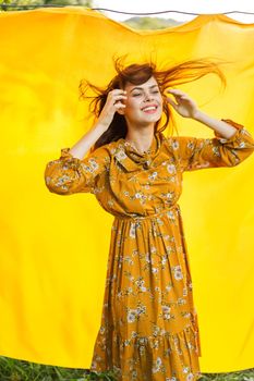 attractive woman outdoors hairstyle summer posing yellow background. High quality photo