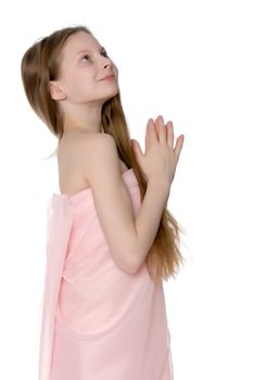 Beautiful little girl close-up. The concept of beauty and fashion, happy childhood. Isolated on white background.