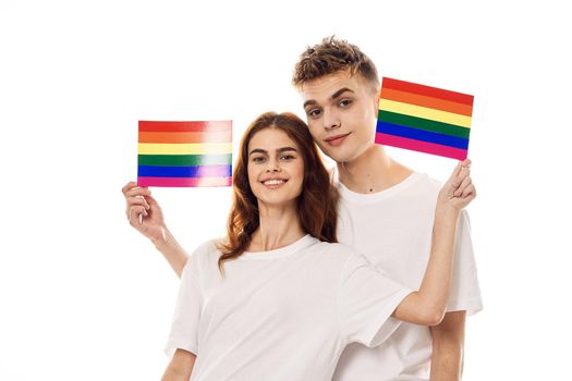 young couple lgbt Flag transgender lifestyle light background. High quality photo