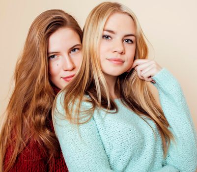 best friends teenage girls together having fun, posing emotional on white background, besties happy smiling, lifestyle real people concept close up. making selfie